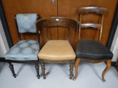 An early 20th century oak elbow chair,