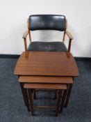 A mid twentieth century teak armchair,