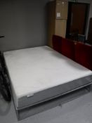 A boxed Ergoflex super king size memory foam mattress,
