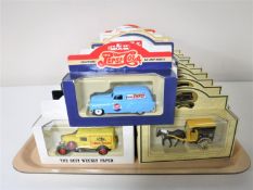 A tray containing thirty boxed diecast vehicles including Pepsi, News of the World,