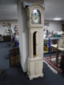 An early twentieth century longcase clock with painted dial,