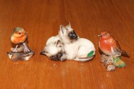 A Beswick figure of two Persian kittens together with two Beswick birds