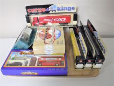 A tray containing four boxed Cargo Kings diecast haulier vans together with a boxed Corgi racing