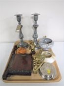 A tray of a pair of pewter candlesticks, Envoy paper cutter, marble ash tray,