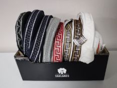 A box containing nine spools of vintage Silver Cross pram trim