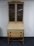 An oak bureau bookcase