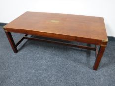 A mahogany brass bound coffee table