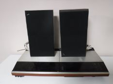 A Bang and Olufsen BeoCentre 7700 together with a pair of Beovox S22 speakers