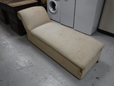 An antique pine upholstered storage chaise lounge