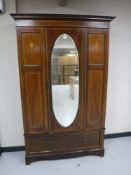 A Victorian inlaid mahogany mirrored door wardrobe CONDITION REPORT: Measures 207cm