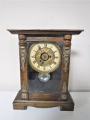 A pine cased American mantel clock