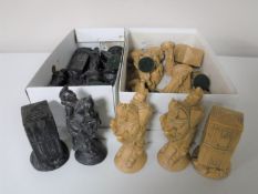 Two boxes containing resin chess pieces and a mid 20th century teddy bear