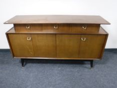A mid twentieth century teak G plan sideboard
