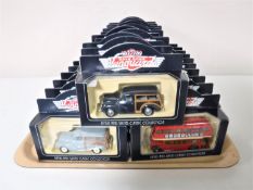 A tray containing thirty boxed Vanguards Days Gone diecast vehicles