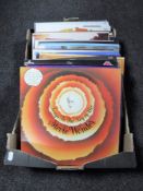 A box containing LP's including Beach Boys, Stevie Wonder,