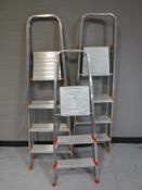 Three sets of aluminium folding steps