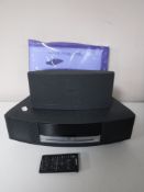 A Bose Wave music system with speaker, leads,