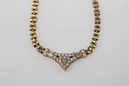 Fine quality 18ct necklace set with round baguette and marquise diamonds, approximately 1.8ct.