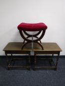A mahogany upholstered dressing table with stool on X frame support,