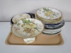 A tray containing a quantity of assorted wall plates and tea plates,