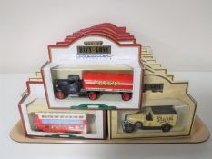 A tray containing thirty boxed Days Gone By diecast vehicles