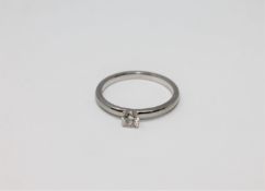 A platinum diamond solitaire ring,