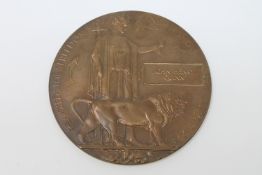 A First World War bronze memorial plaque/medal