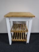 A pine topped butchers block trolley