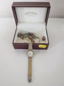 A lady's Rotary wristwatch in box together with two costume necklaces