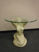 A contemporary lamp table modeled as a mermaid
