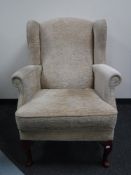 A wing back armchair