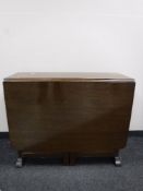 A mid 20th century drop leaf coffee table