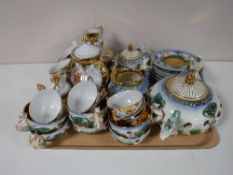 A tray containing a continental tea service,
