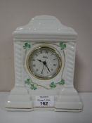 A Belleek china mantel clock