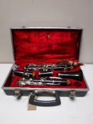 A five piece Boosey and Hawkes clarinet in case with extra mouth piece,