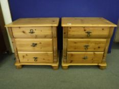 A pair of pine bedside chests