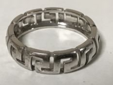 An 18ct white gold Versace ring, size P, 4.5g. CONDITION REPORT: The ring is 22.