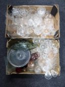 Two boxes containing a quantity of assorted glassware
