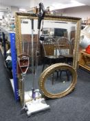 A gilt framed bevel edged overmantel mirror,