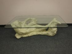 A contemporary coffee table modeled as a mermaid