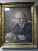 An early 20th century portrait of a gentleman in a gilt composite frame