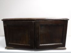 An antique mahogany three drawer cutlery chest containing small quantity of plated cutlery