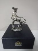 A sterling silver John Pinches figure - 'Playing up', boxed.