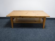 A pine two tier coffee table