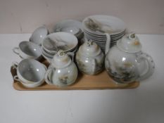 A tray containing a Japanese egg shell tea service