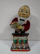 A mid 20th century tin plate bar tender