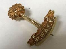A rare high carat gold regimental brooch of the Royal West African Field Force, 7.