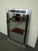 A 120 cm x 180 cm two tone glass mirror