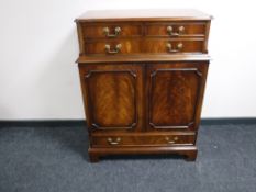 A good quality mahogany audio cabinet