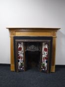 An art deco tiled cast iron fire insert,